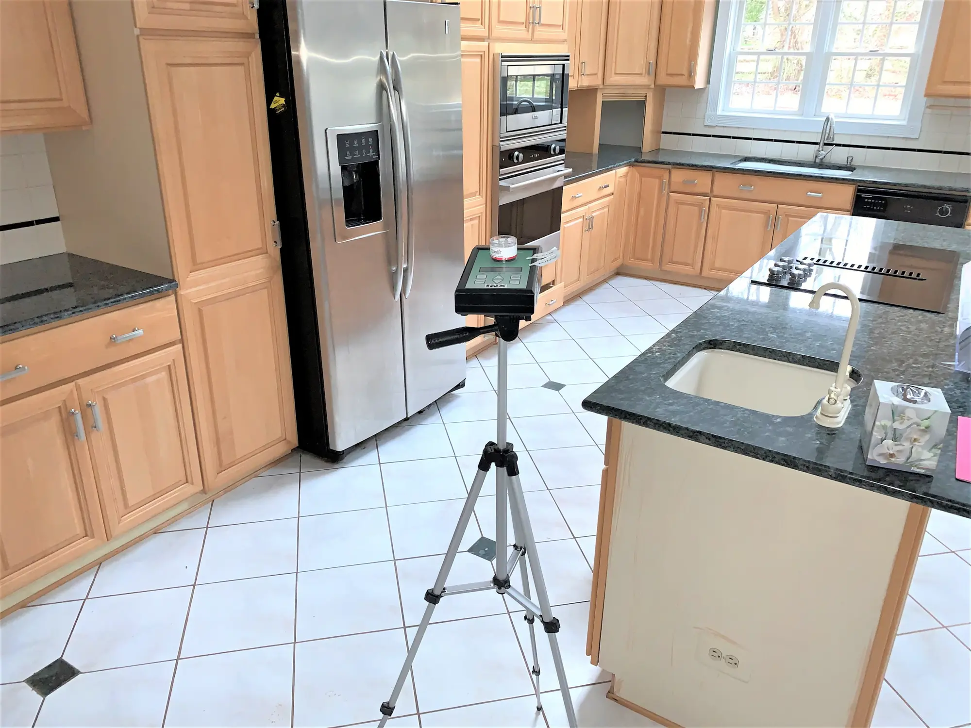  Air sampling in a residential kitchen, mold inspection chester county, mold damage, indoor environment in your home or business
